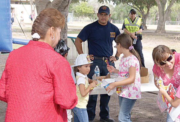 The Los Fresnos Volunteer Fire Department handed out firehats and goodies, HEB were sponsors and passed out free sunscreen and additional HEB goodies.