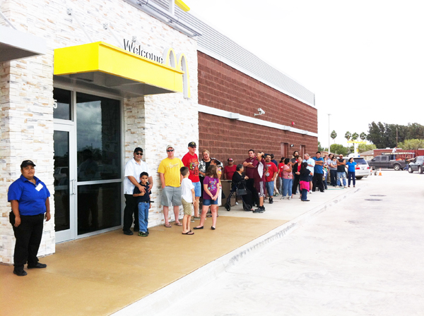 A large eager crowd waited patiently for 2 p.m. to roll around to have the first shot at ordering their meal from the new McDonald’s location which opened right on time