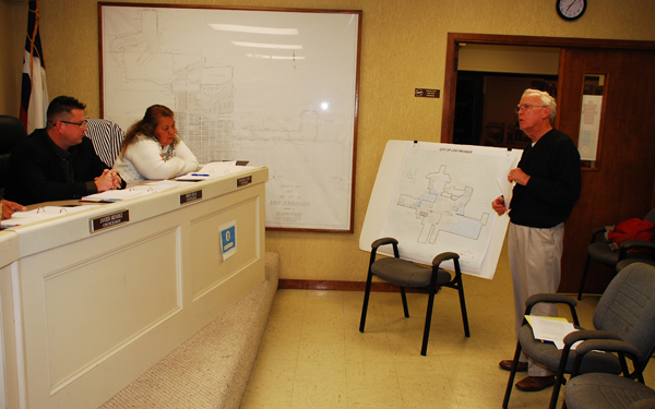 Lance Elliott of TIP Services of South Texas reviews the TIRZ map designating the properties that fall in the zone.  LFN Photo