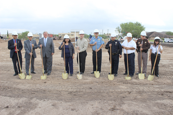 The Cameron County Emergency Communication District celebrates construction underway for its new headquarters in Harlingen on October 21. From the left are Joel Davila, deputy director; Mario Prado, retired La Feria volunteer fire chief and president of the district’s Board of Managers, Harlingen Mayor Chris Boswell; Silbia Barajas, executive director; Humberto Barrera, emergency management coordinator; Bill Aston, vice president of the Board of Managers; Brownsville police Lt. Raul Rodriguez, board member; Brownsville fire Deputy Chief David Hinojosa, board member; Cameron County sheriff’s Lt. Domingo Diaz, board member; and Irma Bramlett of AT&T, secretary of the Board of Managers.