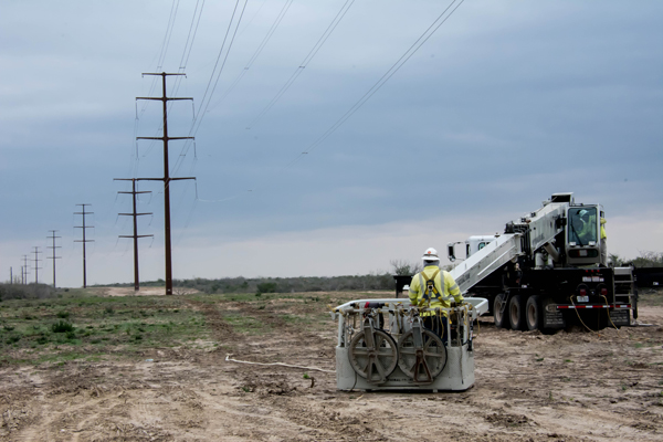 A contractor for Electric Transmission Texas (ETT) prepares to work on the 138-kV transmission line from the Lobo station to the Molina station near Rio Bravo. Photo: Electric Transmission Texas