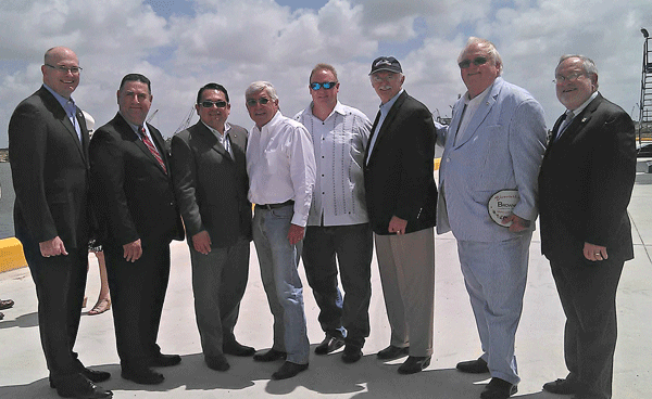 from l to r:  Paul Jaenichen, U.S. Maritime Administrator; Carlos Masso, Port of Brownsville Commissioner; Sergio Lopez, Port of Brownsville Commissioner; Brownsville Mayor Tony Martinez; John Reed; Port of Brownsville Commissioner; John Wood, Port of Brownsville Commissioner; Ralph Cowen, Port of Brownsville Board Chairman; Eduardo Campirao, Port of Brownsville Director/CEO