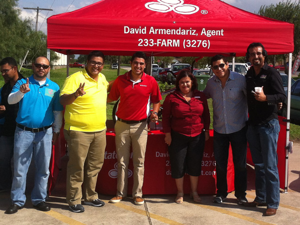 Staff from the local State Farm office and Organo representative join with the crew of La Mega 105.9 to celebrate the one year anniversary of business in Los Fresnos