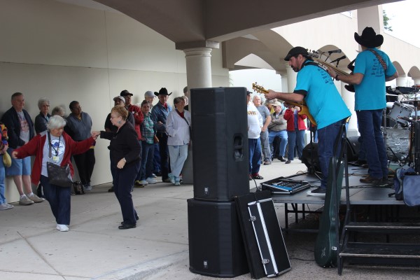 Two Winter Texans dance to music by Sergio and Ropin’ the Wind at the Winter Texan Appreciation Fiesta in Harlingen on January 19, 2015. myharlingen.us